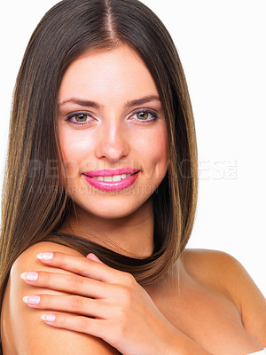 Buy stock photo Studio portrait of a beautiful young woman posing against a white background