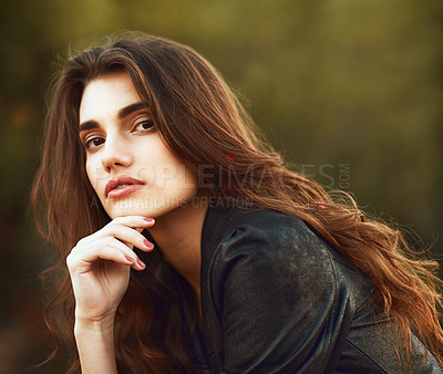 Buy stock photo Portrait of an attractive young woman spending some time outdoors