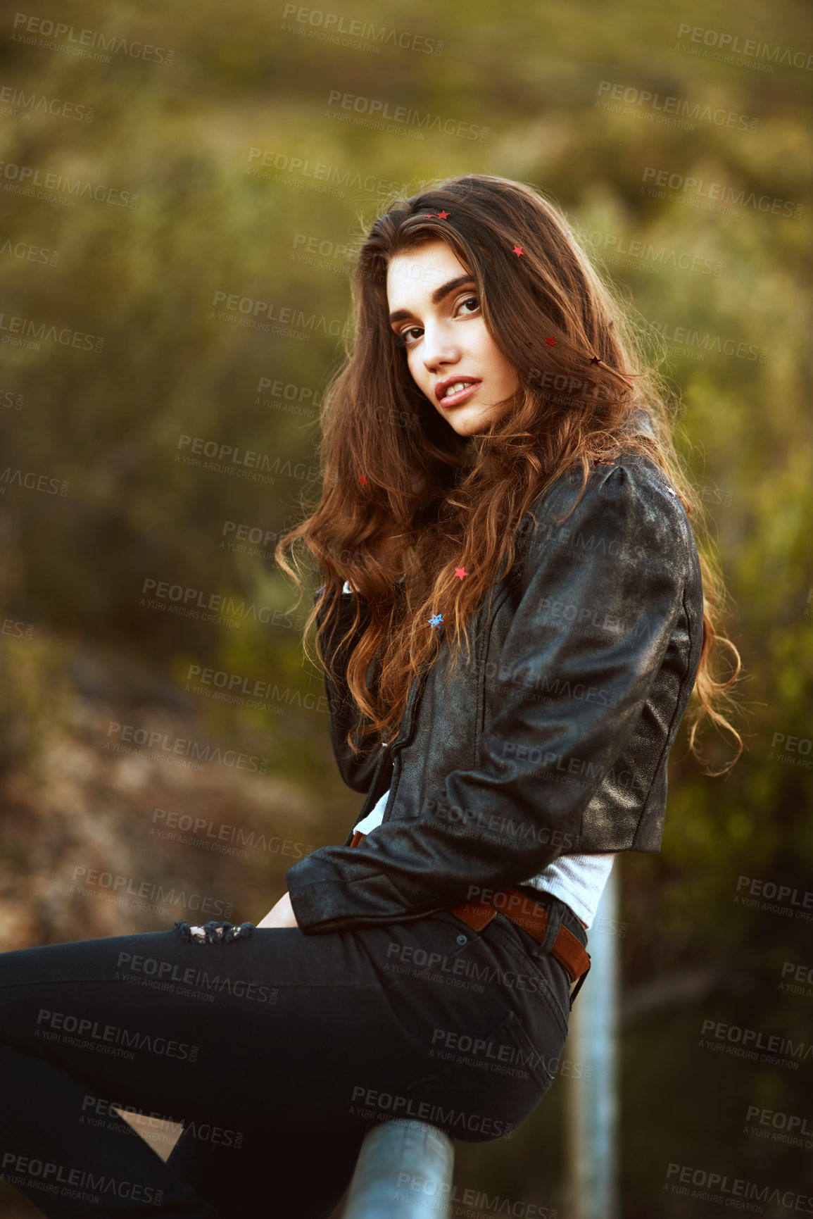 Buy stock photo Portrait of an attractive and stylish young woman spending some time outdoors