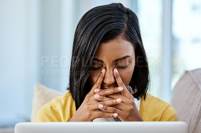 Buy stock photo Shot of a teenage girl experiencing a headache at home