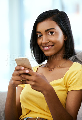 Buy stock photo Indian girl, portrait and smartphone on sofa in home for social media scroll, internet subscription and online streaming. Gen z, happy person and phone on couch for text message, dating app and relax