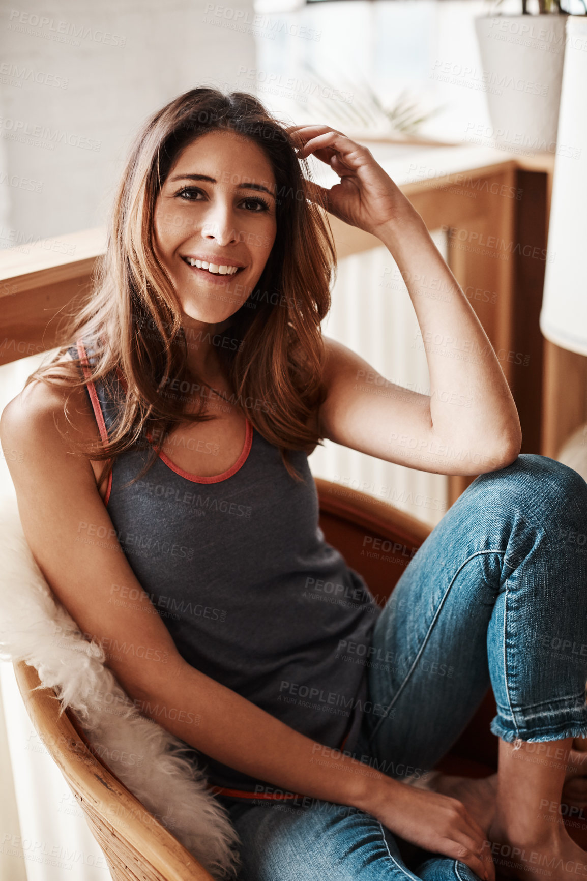 Buy stock photo Portrait of an attractive young woman relaxing at home