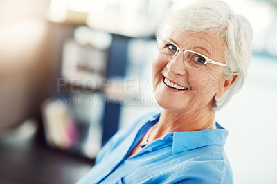 Buy stock photo Cropped portrait of a senior woman standing in her home
