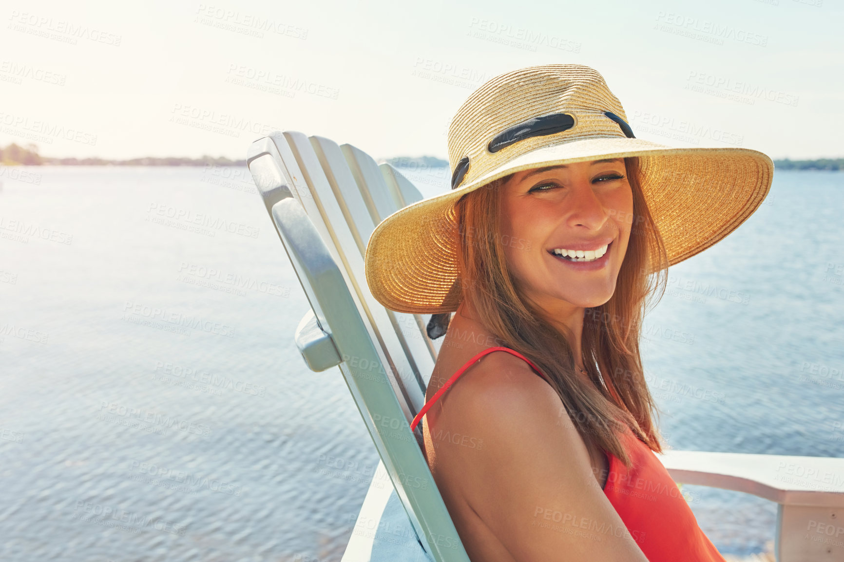 Buy stock photo Portrait, beach and woman with smile, summer and travel for vacation, getaway trip and Bali. Face, person and girl on chair, holiday and adventure with journey, water and tourism with tropical island