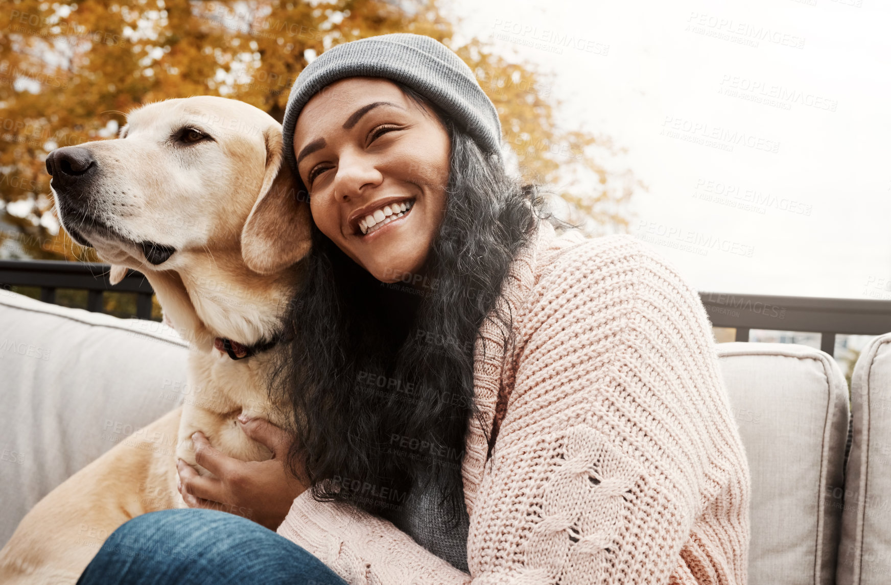 Buy stock photo Happiness, woman and dog on bench for hug, adoption and loyalty in garden. Mental health, female person and emotional support animal in autumn with labrador, therapy and relief from anxiety with pet