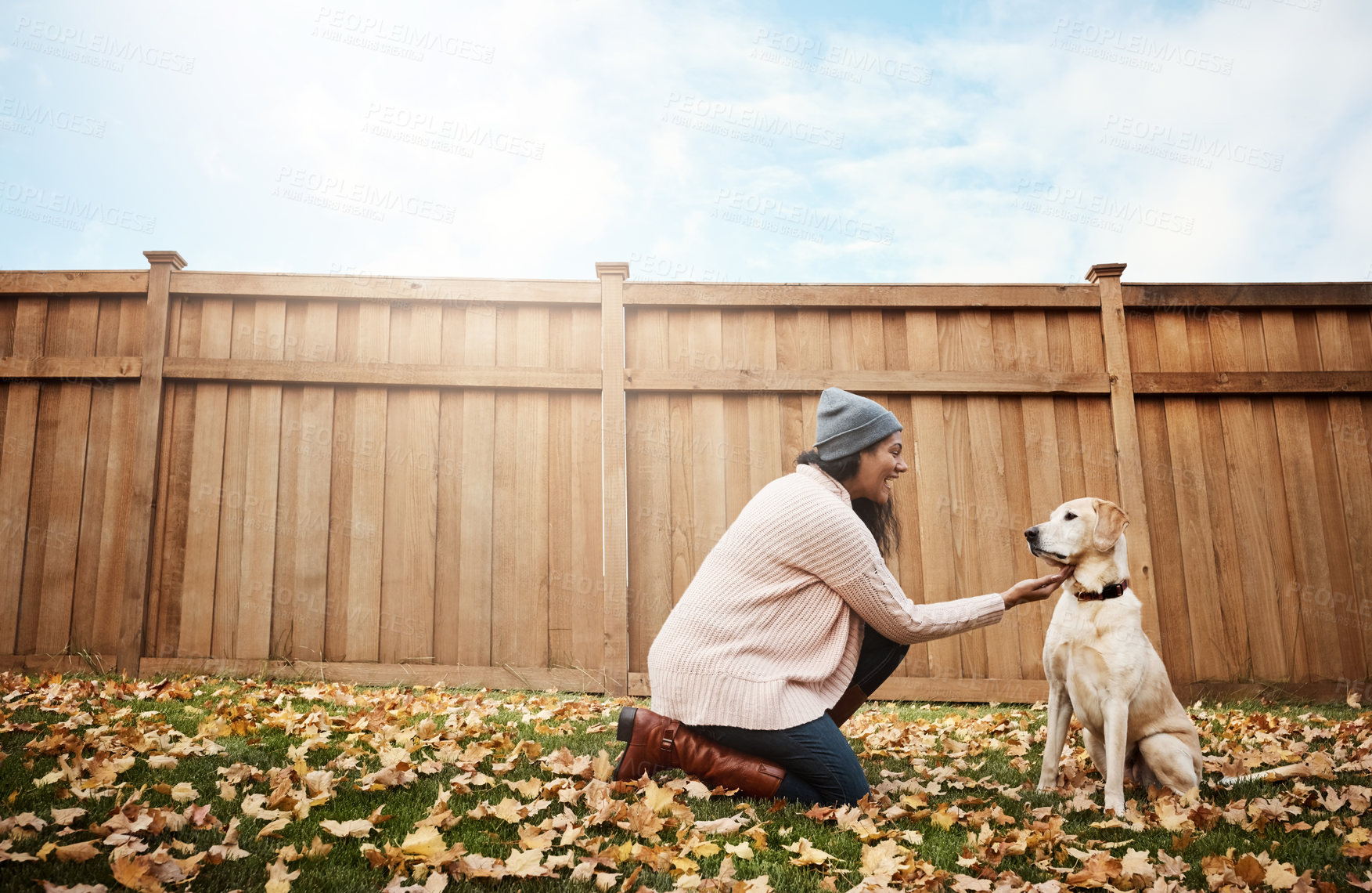 Buy stock photo Home, woman and excited with dog on backyard for friendship, bonding and trust for care and support. Female person, animal and pet owner with playing for fun, relax and enjoy for welfare and adoption