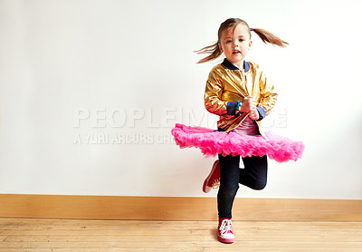 Buy stock photo Shot of a little girl dancing in a dance studio