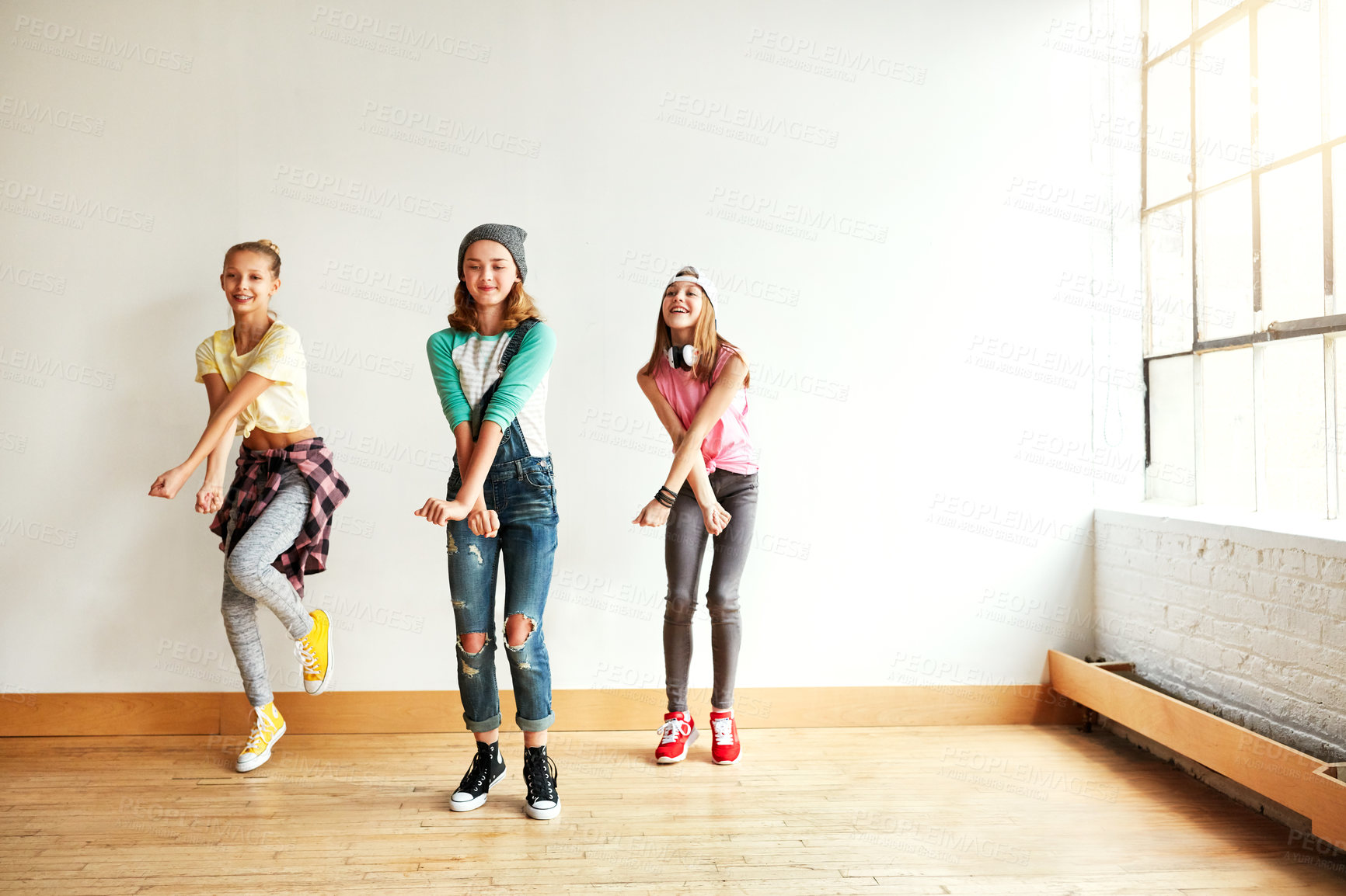 Buy stock photo Dancing, girl group and children with music, studio and rhythm for creative art performance or rehearsal. Smile, culture and happy kids in cool hip hop crew for practice, routine or learning in class