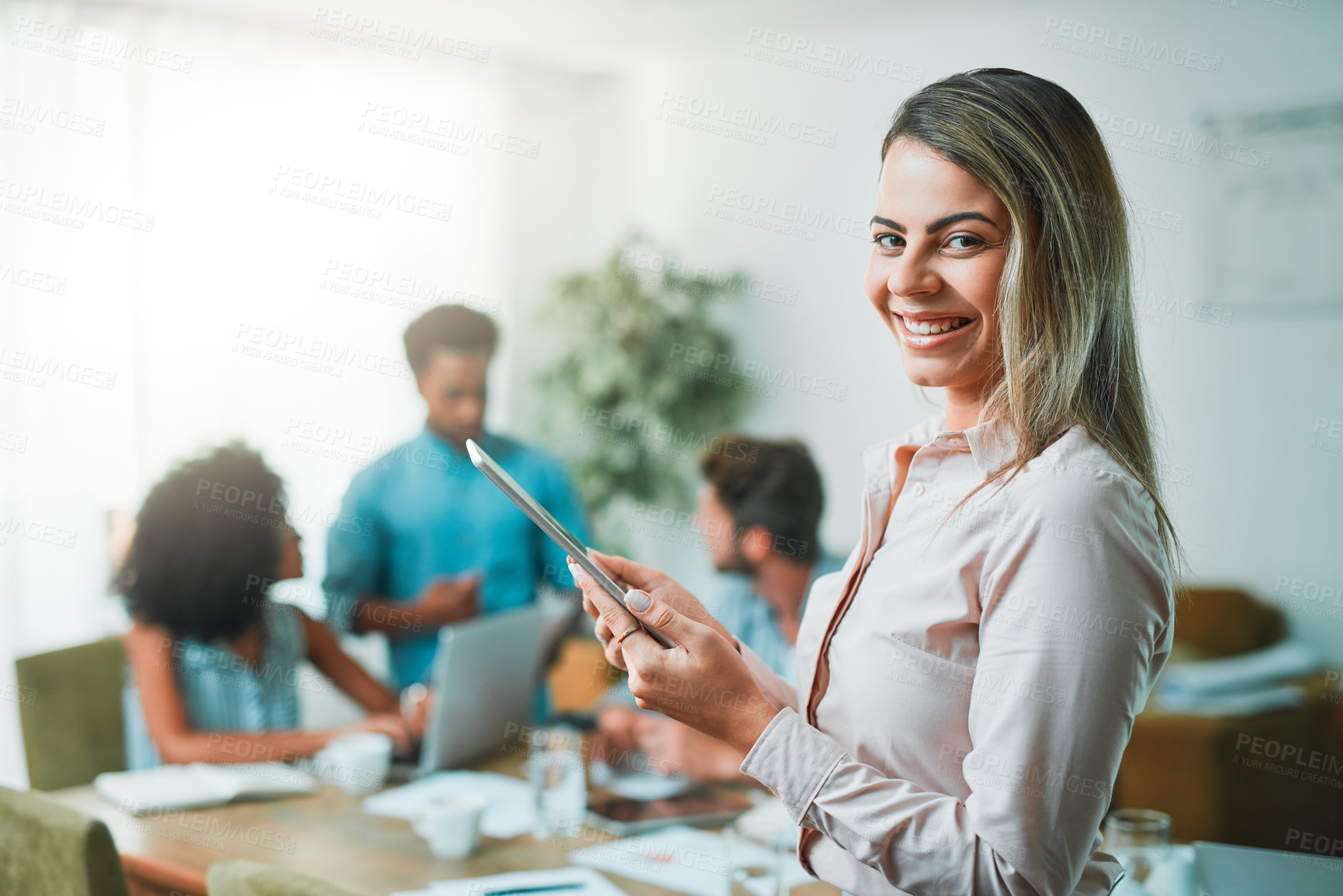 Buy stock photo Shot of young designers working in a modern office