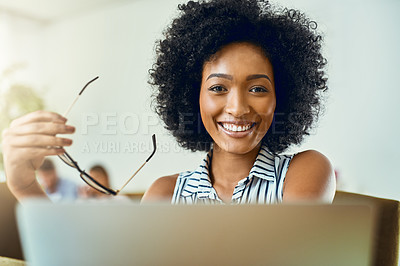 Buy stock photo Cropped shot of a young female designer working in a modern office