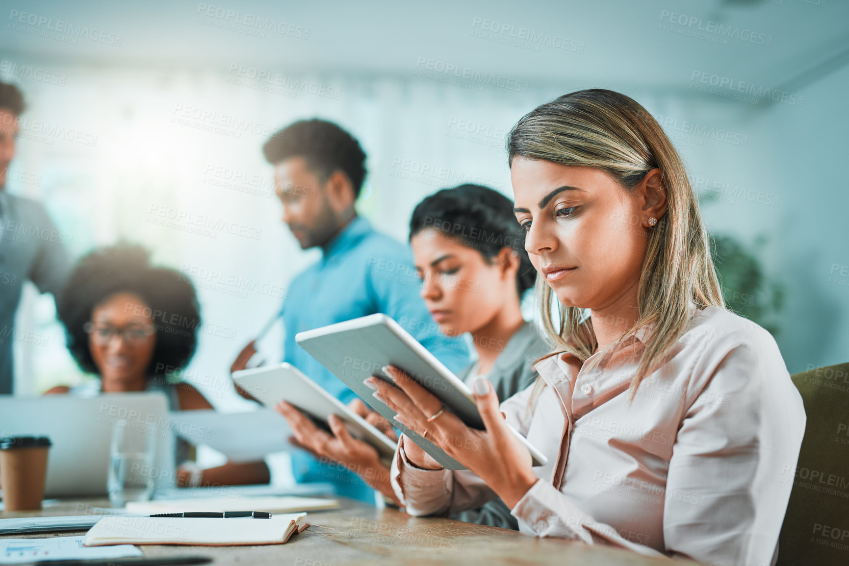 Buy stock photo Shot of young designers working in a modern office