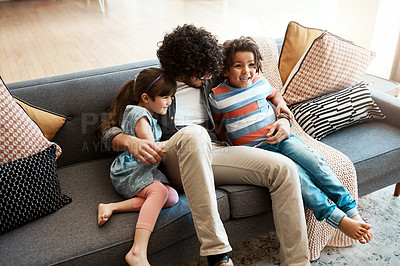 Buy stock photo Family, dad and kids with hug on sofa for love, appreciation and bonding together in living room. Care, happy and man with embrace of children at home for support, trust and parenting in childhood