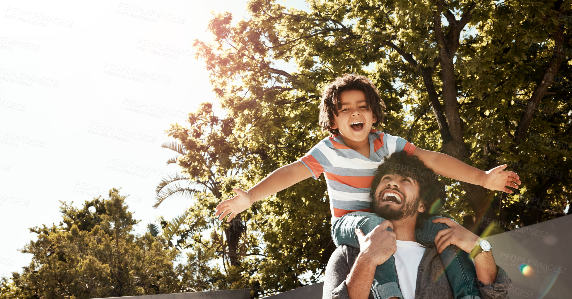 Buy stock photo Happy dad, child and bonding with piggyback at backyard for love, freedom or holiday together at home. Father with son, kid or little boy on shoulder for fun flying or enjoying weekend in nature