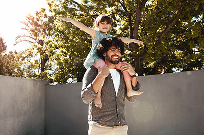 Buy stock photo Happy father, daughter and bonding with piggyback at backyard for love, freedom or holiday together at home. Dad with child, kid or little girl for shoulder, fun flying or enjoying weekend in nature