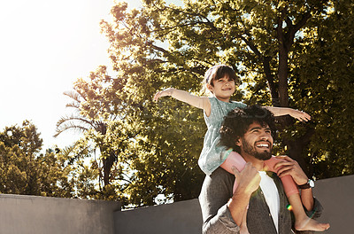 Buy stock photo Happy father, child and bonding with piggyback at backyard for love, freedom or holiday together at home. Dad with daughter, kid or little girl for shoulder, fun flying or enjoying weekend in nature