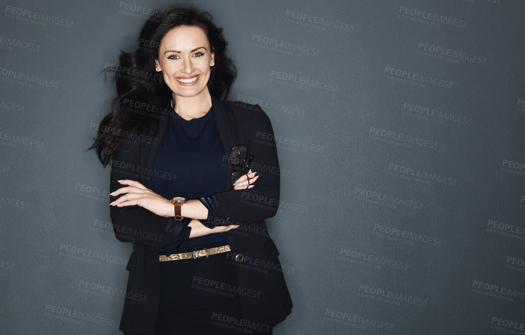 Buy stock photo Studio shot of a young attractive corporate businesswoman posing against a grey background