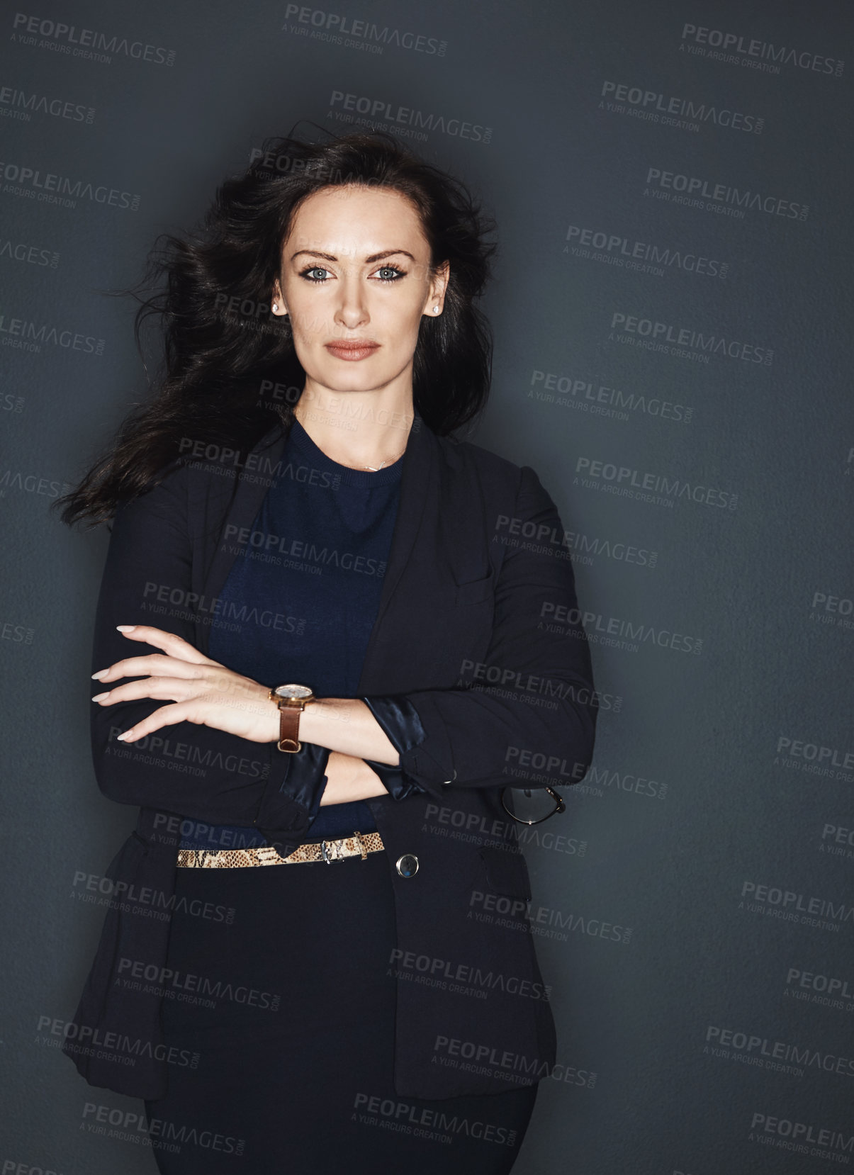 Buy stock photo Studio shot of a young attractive corporate businesswoman posing against a grey background