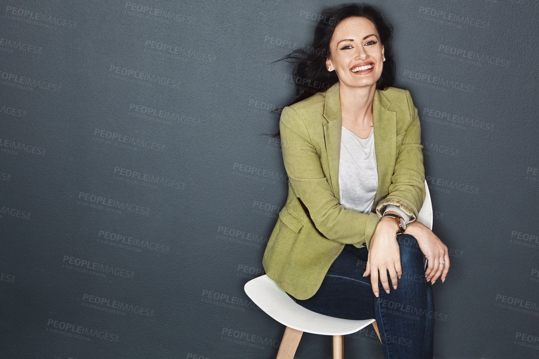 Buy stock photo Studio shot of a young attractive casual businesswoman posing against a grey background