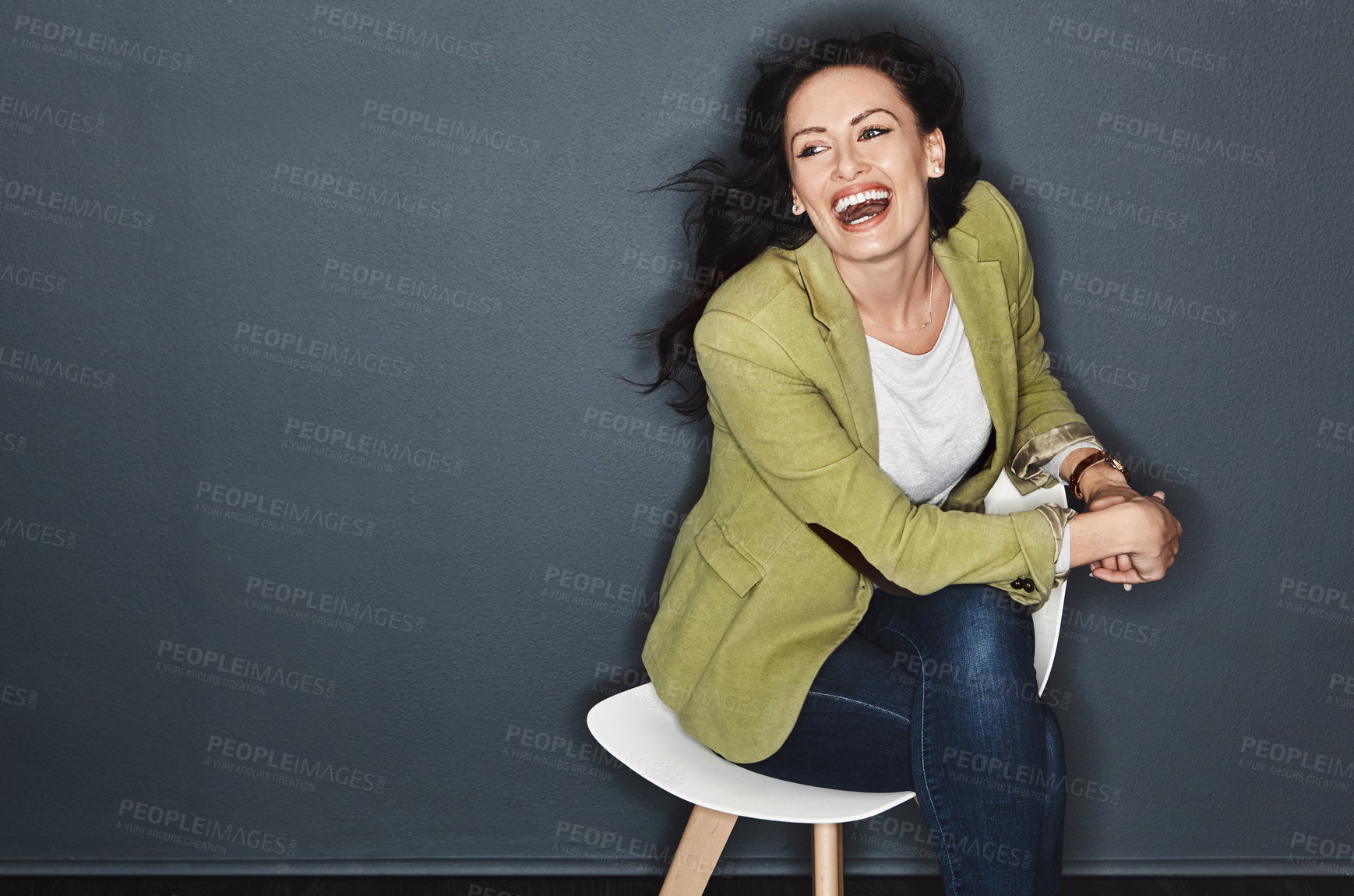 Buy stock photo Studio shot of a young attractive casual businesswoman posing against a grey background