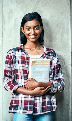 Buy stock photo Portrait of a young female student outside on campus