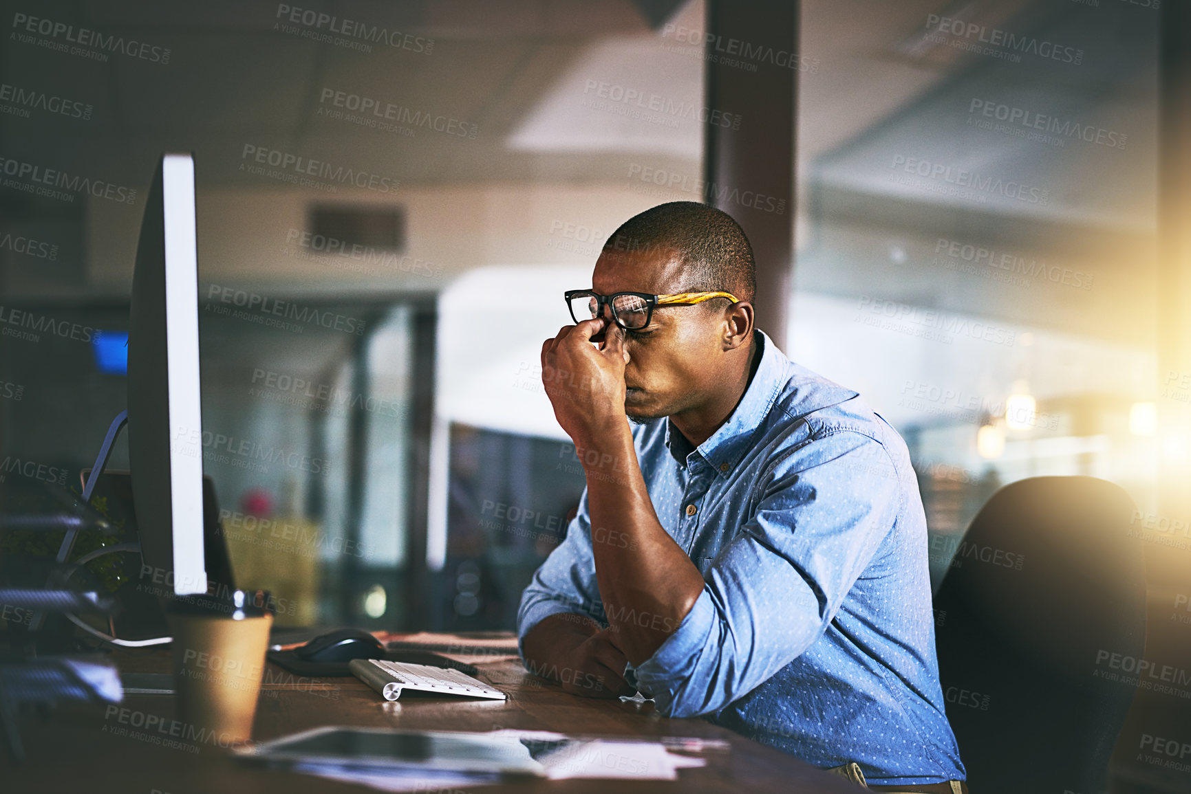 Buy stock photo Black business man, stress and fatigue in night, office and headache by computer for project deadline. African businessman, burnout or anxiety in workplace by pc, web design startup and mental health