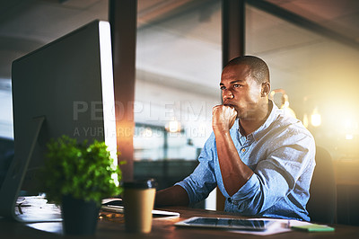 Buy stock photo Thinking, computer and business black man at night for website, research and reading news in office. Creative, developer and worker online for software update, networking and working on web design