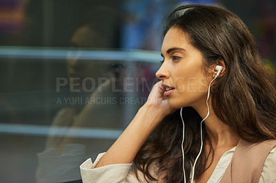 Buy stock photo Train, travel and woman with music by window for journey, commute and passenger on metro transit. Public transport, streaming and person with earphones listening to podcast, audio and radio on subway