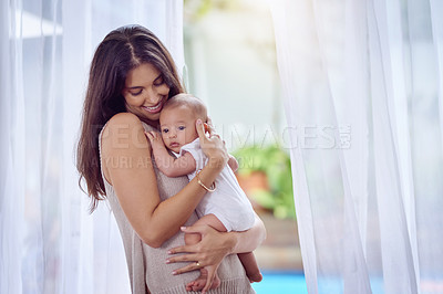 Buy stock photo Happy mother, baby and hug with care for love, motherhood or bonding together at home. Mom with smile and holding little child, newborn or young infant for peace, weekend or family time at house