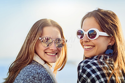 Buy stock photo Friends, women and outdoor sunglasses by beach, bonding and travel to Berlin on weekend trip. People, happy together and peace on vacation to sea, reflection and united in sisterhood or relationship