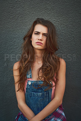 Buy stock photo Wall, confused and fashion for woman, trendy and gen z with streetwear, doubt and stylish with clothes. Beauty, portrait and person with hairstyle, uncertain and treatment of hair, cool and haircare