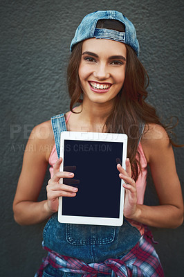 Buy stock photo Happy girl, portrait and fashion with tablet screen in marketing, advertising or presentation on a wall background. Young female person or model with smile, technology display or mockup space for app