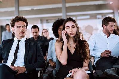 Buy stock photo Business woman, diversity and phone call in communication, connection or networking in workplace. Group of people, employee engagement and mobile tech in conference, workshop or tradeshow as audience