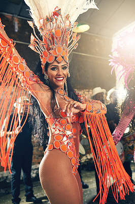 Buy stock photo Brazilian woman, dancing or carnival costume in night party, festive celebration dance or Rio de Janeiro performance. Portrait, smile or happy dancer with feather headdress, fashion clothes or makeup