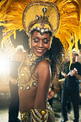 Buy stock photo Cropped shot of a beautiful samba dancer performing at Carnival