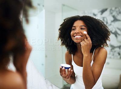 Buy stock photo Skincare, bathroom mirror and black woman with cream, smile and morning dermatology routine. Health, wellness and luxury skin care at home, girl in reflection with lotion on face for facial treatment