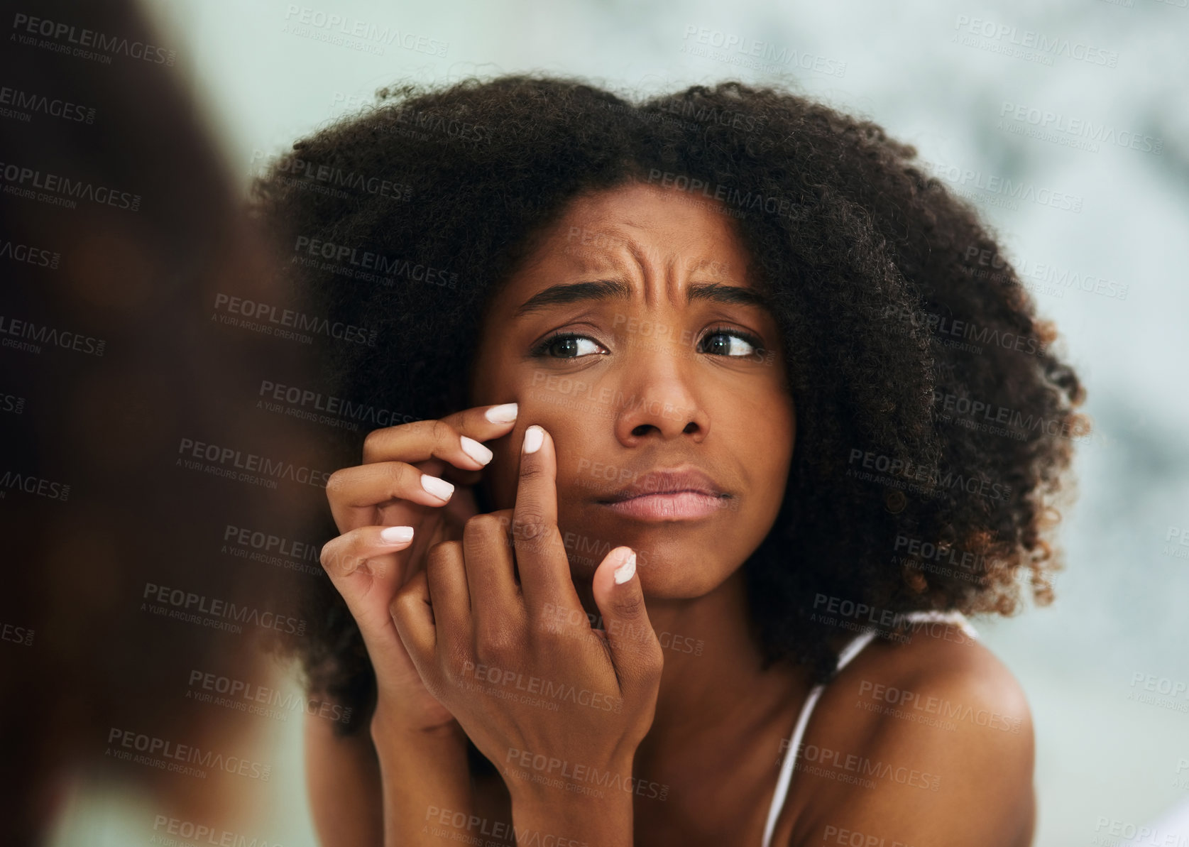 Buy stock photo Mirror, acne and black woman in bathroom for hygiene, skincare and natural face routine. Cosmetic, dermatology and reflection of female person with facial treatment, pop pimple and morning in home