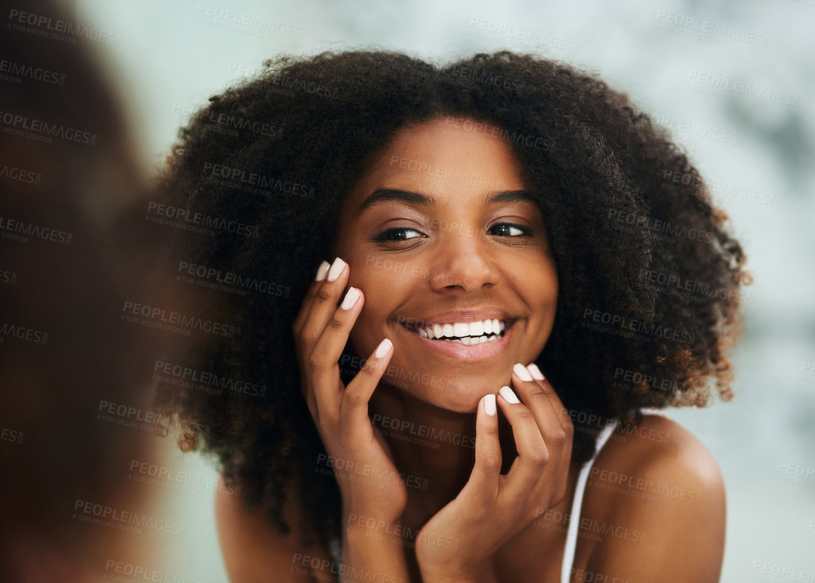 Buy stock photo Mirror, satisfaction and black woman in bathroom for hygiene, skincare and natural face routine. Cosmetic, dermatology and reflection of smile with facial treatment, wellness and morning in home