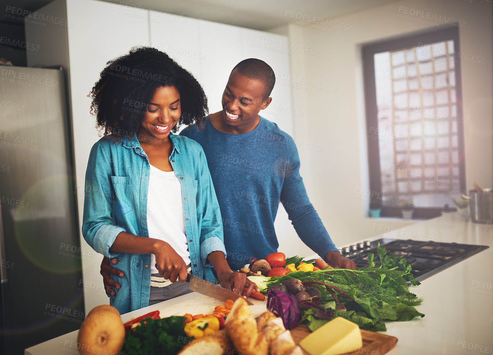 Buy stock photo Black couple, people and happy in kitchen with vegetables for cooking on diet, nutrition and health. Home, relationship and smile with fresh food for organic, vegetarian meal and wellness or care