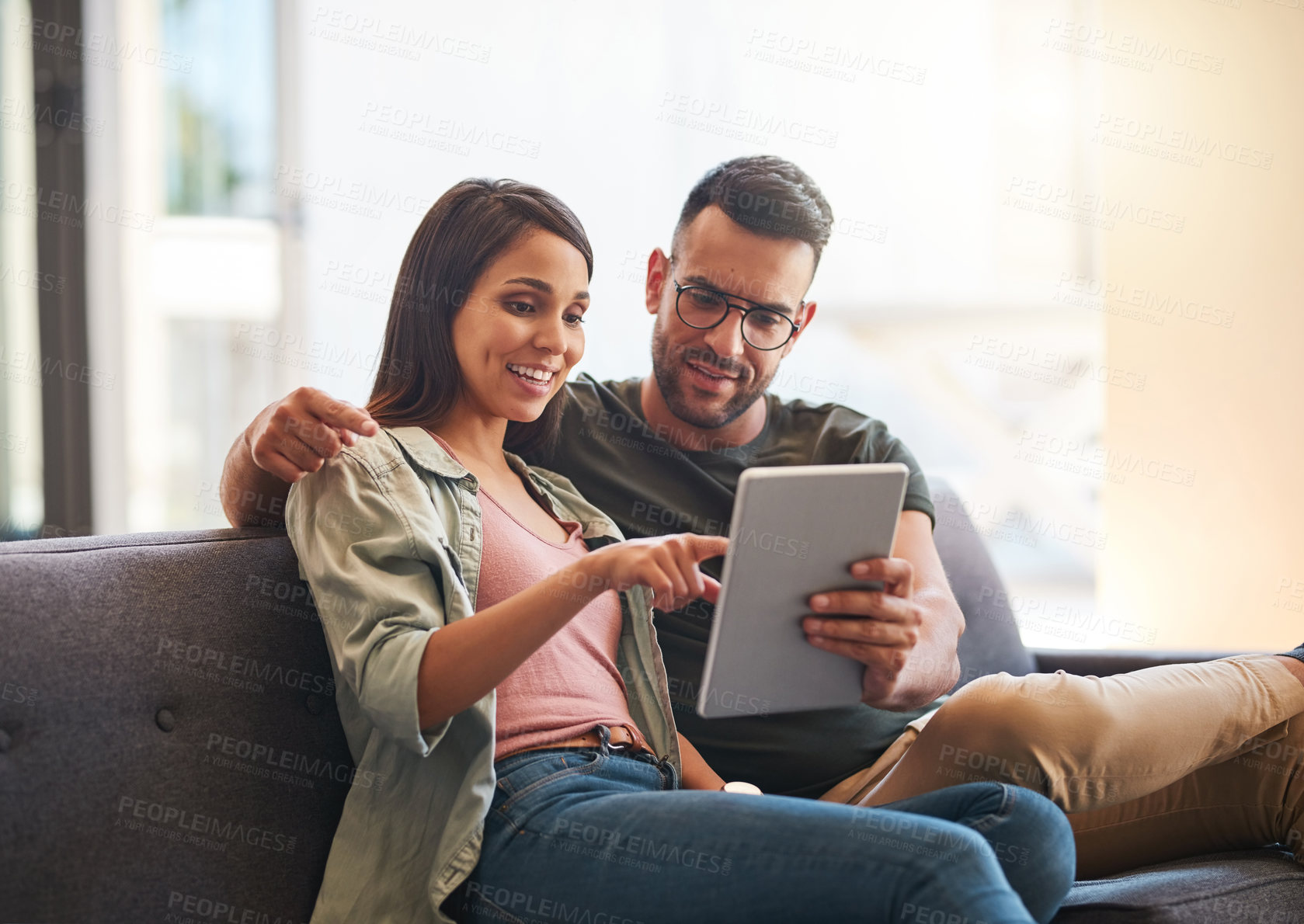 Buy stock photo Happy, couple and relax with tablet at house for financial planning, loan research and mortgage application. Smile, people and digital for banking payment, finance budget and investment with bonding 