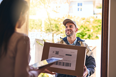 Buy stock photo Shot of a courier making a delivery to a customer 