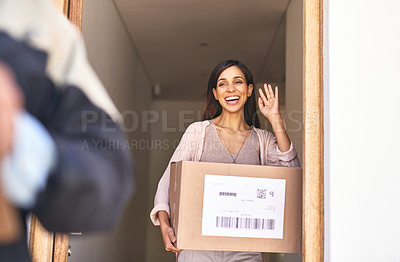 Buy stock photo Shot of a young woman waving goodbye to a delivery man