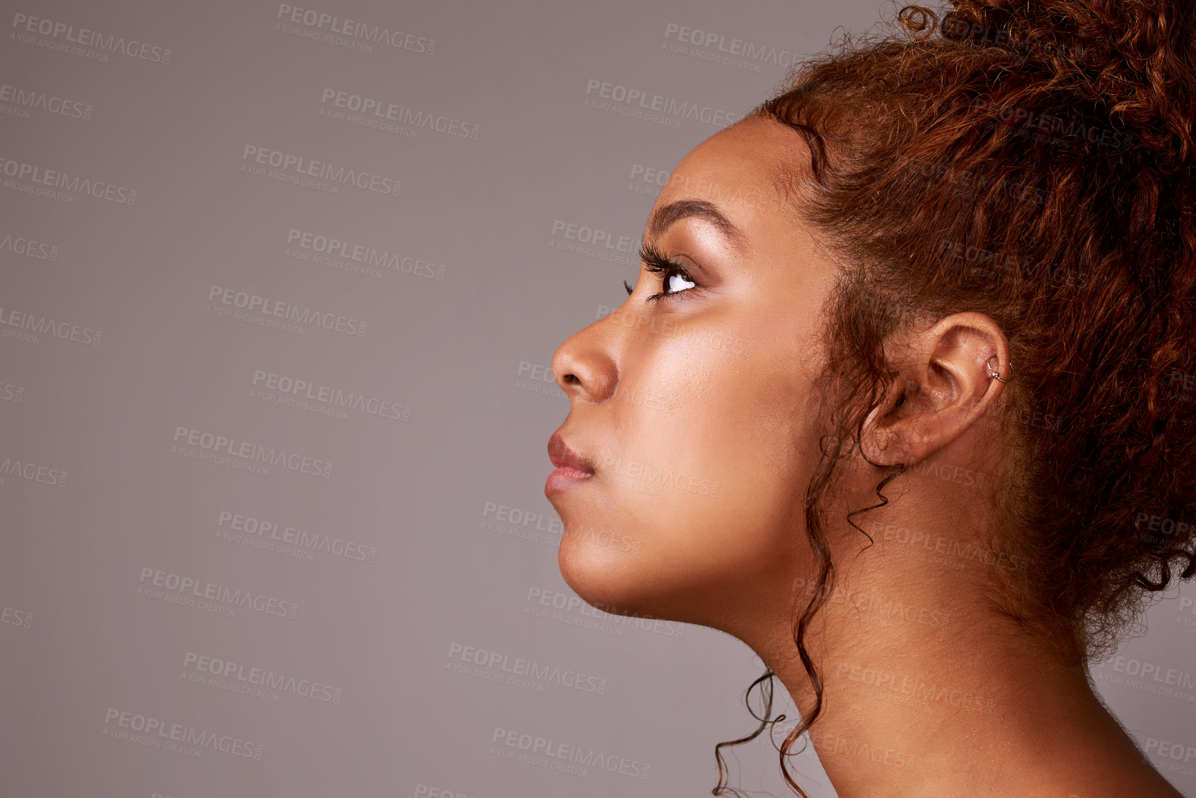 Buy stock photo Skincare, mockup and girl thinking in studio with cosmetics, questions or tips on grey background. Beauty, face and model with space for dermatology ideas, questions or diy, self care and promotion