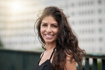 Buy stock photo Woman, smile and portrait in city for travel, holiday and adventure with excited outdoor or lens flare. Female person, happy and face in urban town for getaway trip, vacation and journey in Argentina