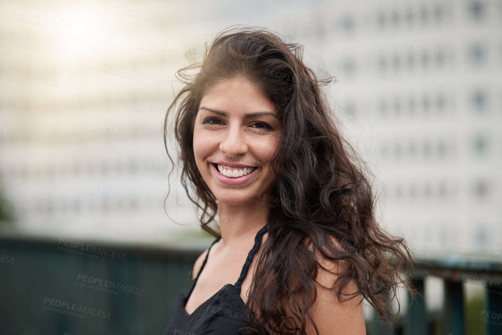 Buy stock photo Woman, smile and portrait in city for travel, holiday and adventure with excited outdoor or lens flare. Female person, happy and face in urban town for getaway trip, vacation and journey in Argentina