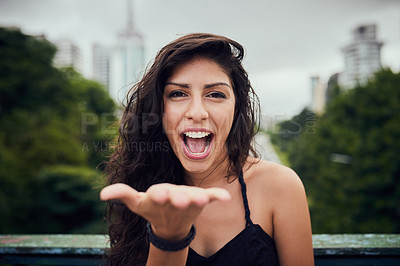 Buy stock photo Happy, woman and portrait with blow kiss, love and urban park with smile outdoor with travel and vacation. Town, holiday and weekend break with confidence and city with joke and trip to New York