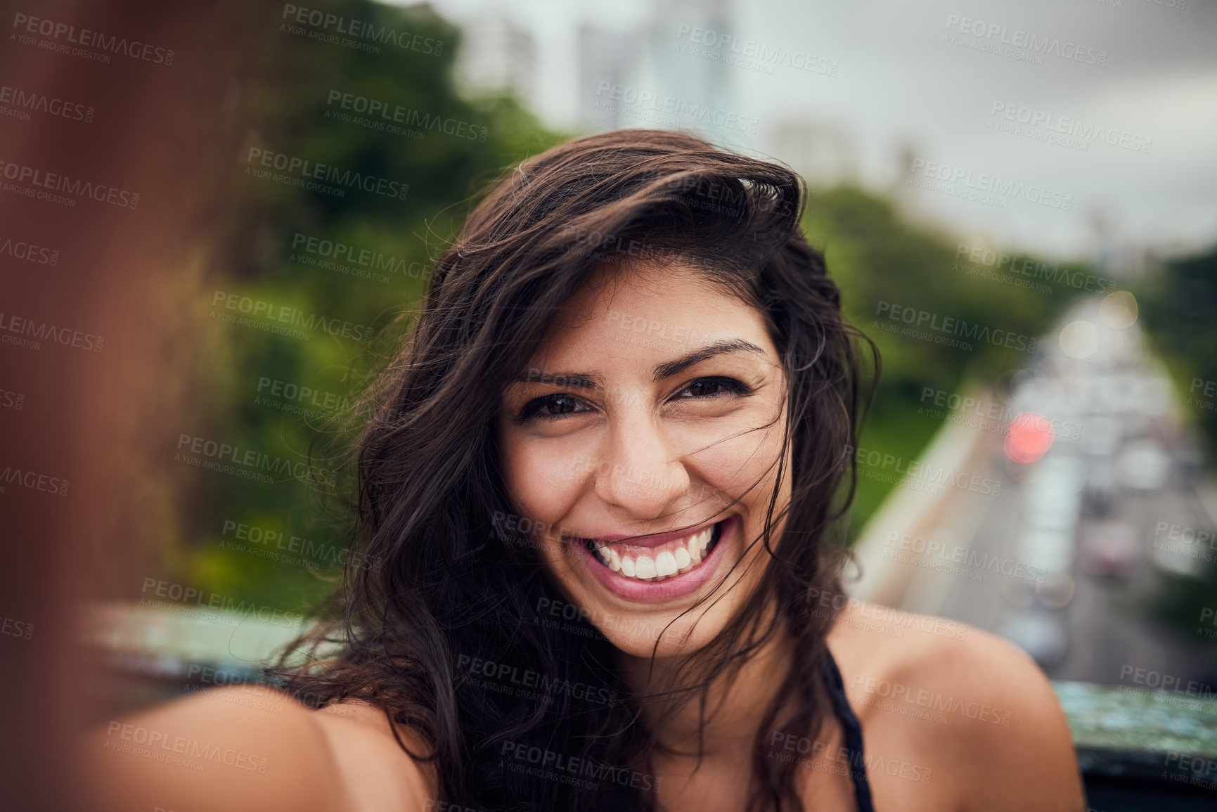 Buy stock photo Portrait of an attractive young woman taking a selfie out in the city