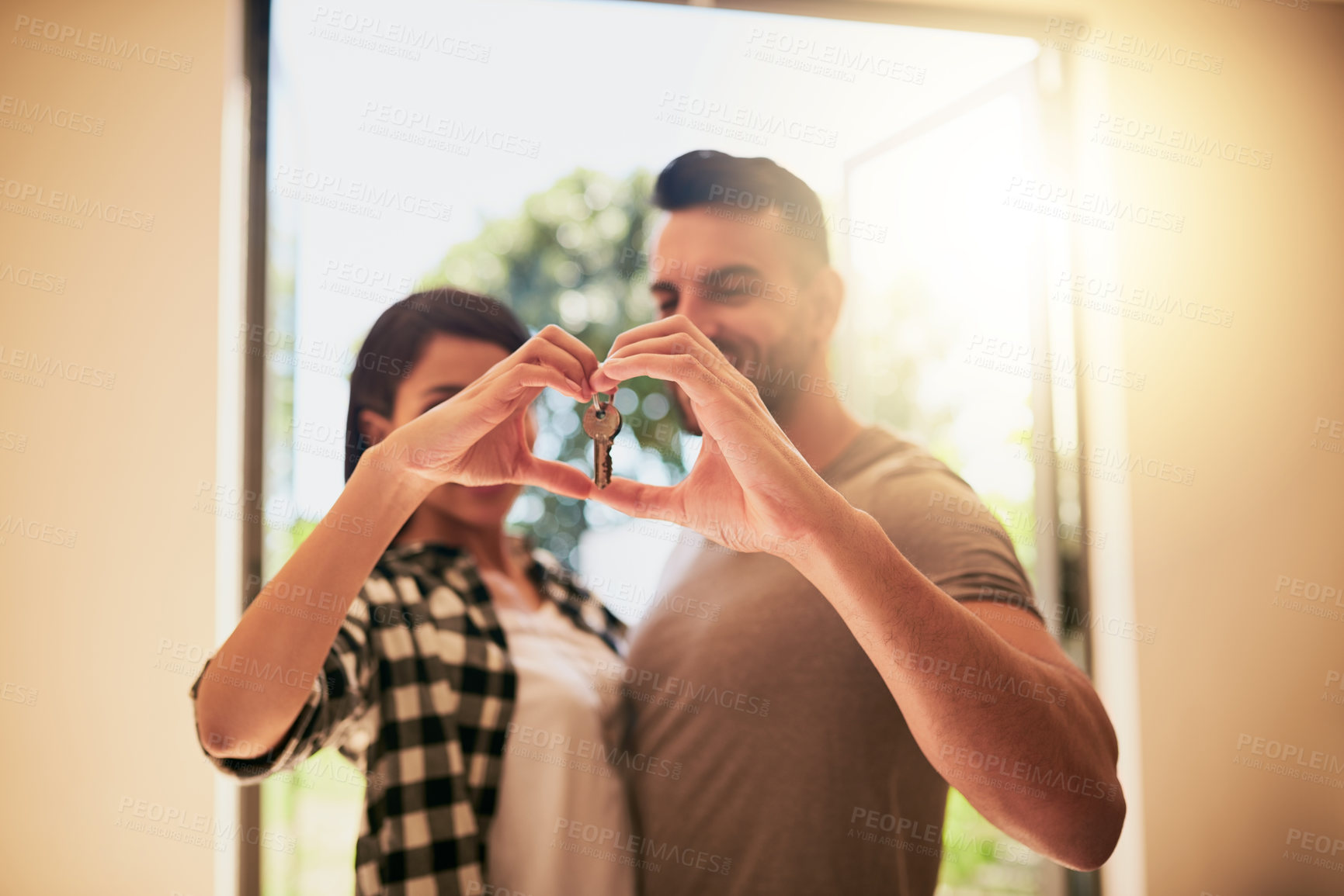Buy stock photo Couple, keys and heart for real estate, home owner and loan for finance. Love emoji, sale for man and female person partnership with mortgage, property investment and apartment purchase with hands