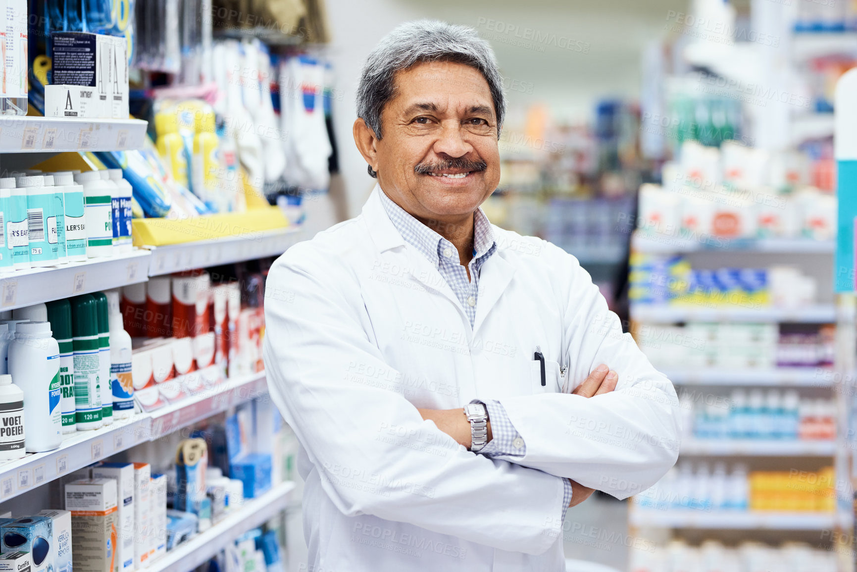 Buy stock photo Portrait of a mature pharmacist working in a chemist