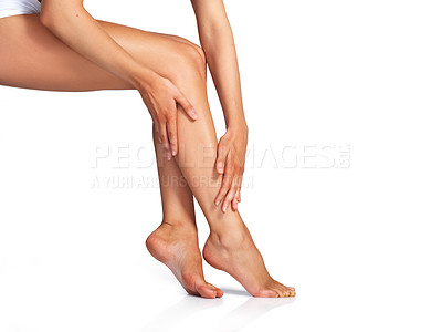 Buy stock photo Studio shot of a sexy young woman posing against a white background