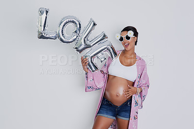 Buy stock photo Pregnant, love and woman in studio with balloon excited for motherhood, maternity and gender party. Pregnancy, happy and isolated person with sunglasses, decoration and fashion on white background